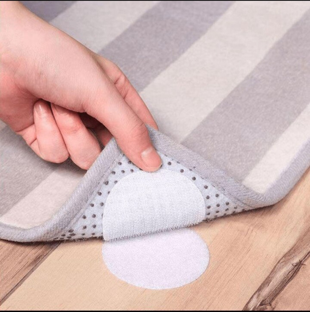 ملصق تثبيت السجاد